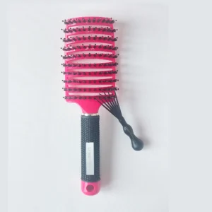 DreamGlow Anti-klit Haarborstel in fuchsia op neutrale achtergrond