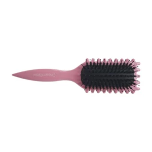 DreamGlow CurlFlex Krulborstel in roze in gebruik getoond