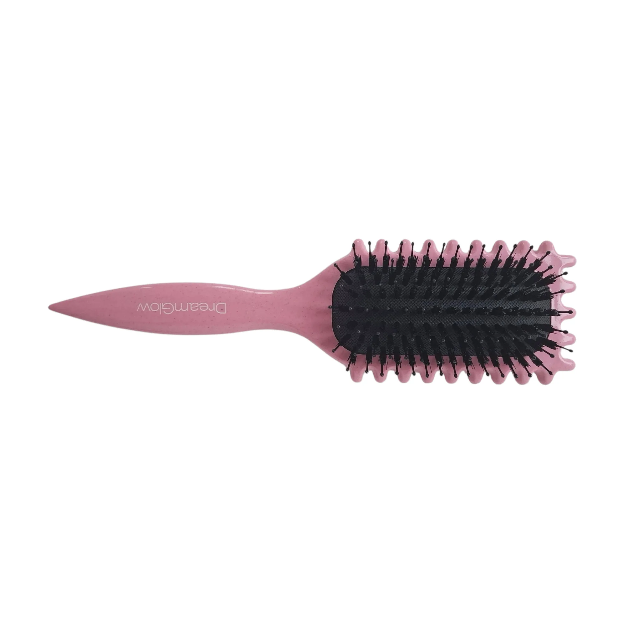 DreamGlow CurlFlex Krulborstel in roze in gebruik getoond