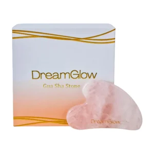 DreamGlow Gua Sha Steen in rozenkwarts op neutrale achtergrond