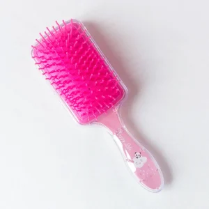 DreamGlow Magische Kinderborstel in roze roze op neutrale achtergrond