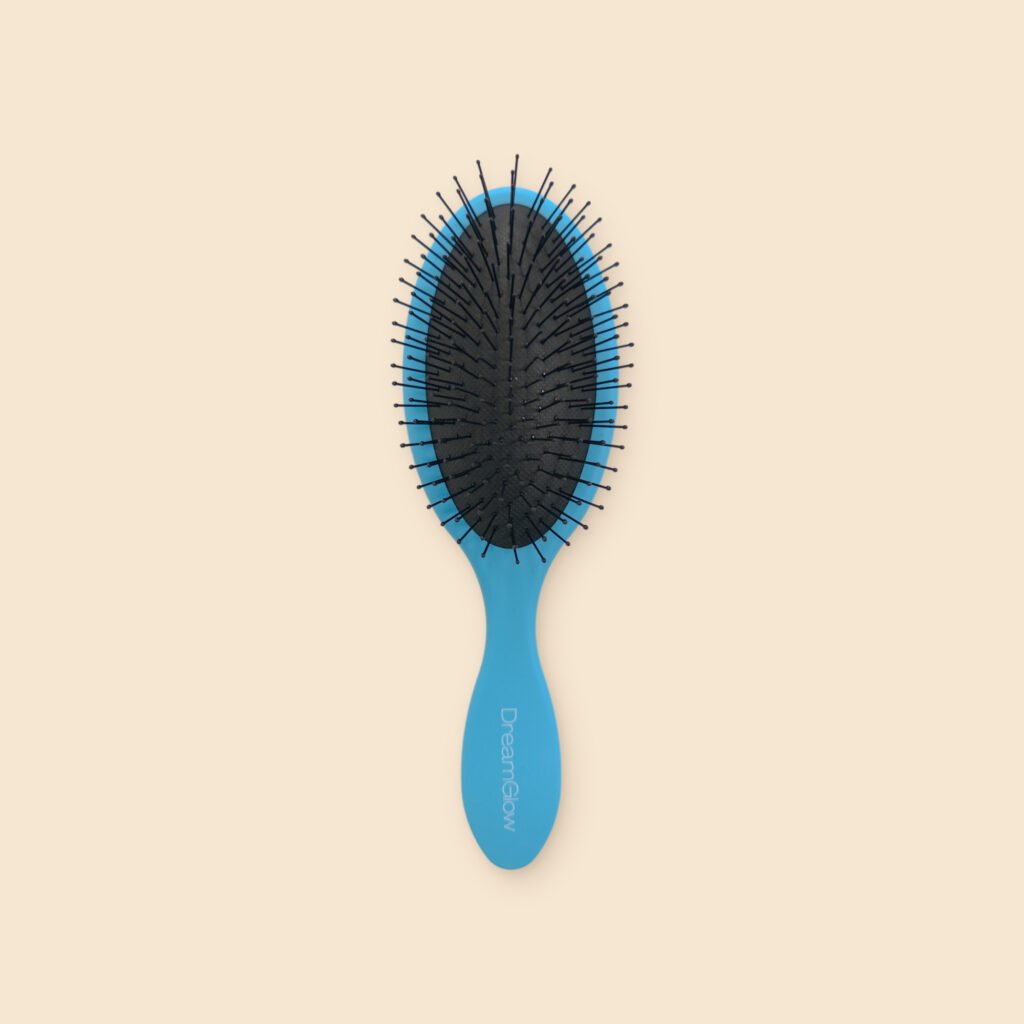DreamGlow Ovale ontklitborstel Blauw – voorkant met de pinnen