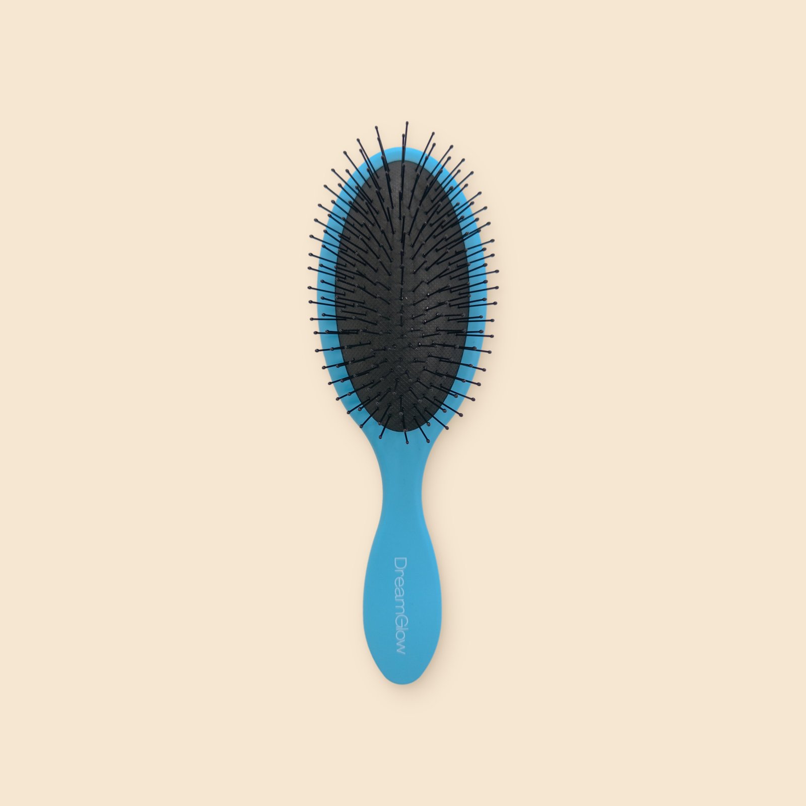 DreamGlow Ovale ontklitborstel Blauw – voorkant met de pinnen