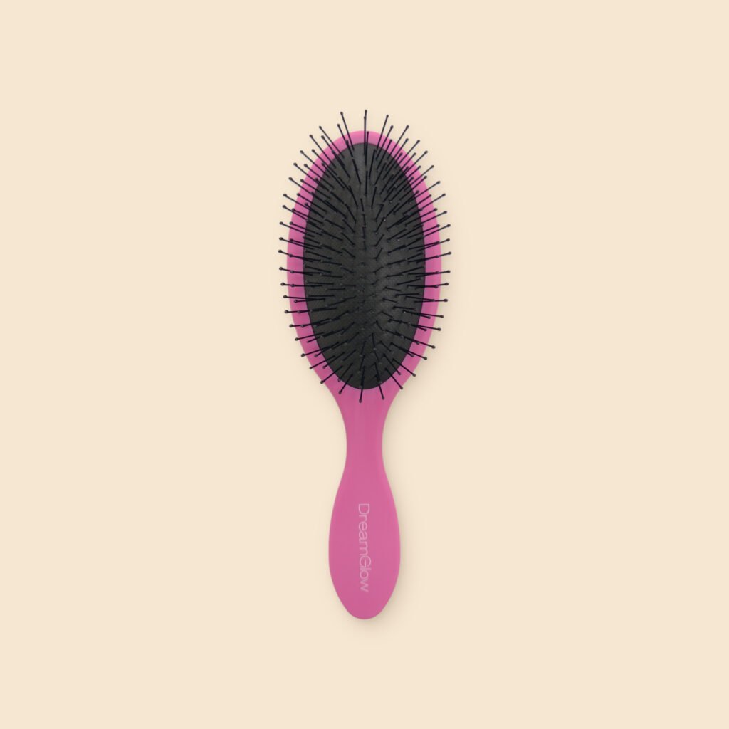 DreamGlow Ovale ontklitborstel Roze – voorkant met de pinnen