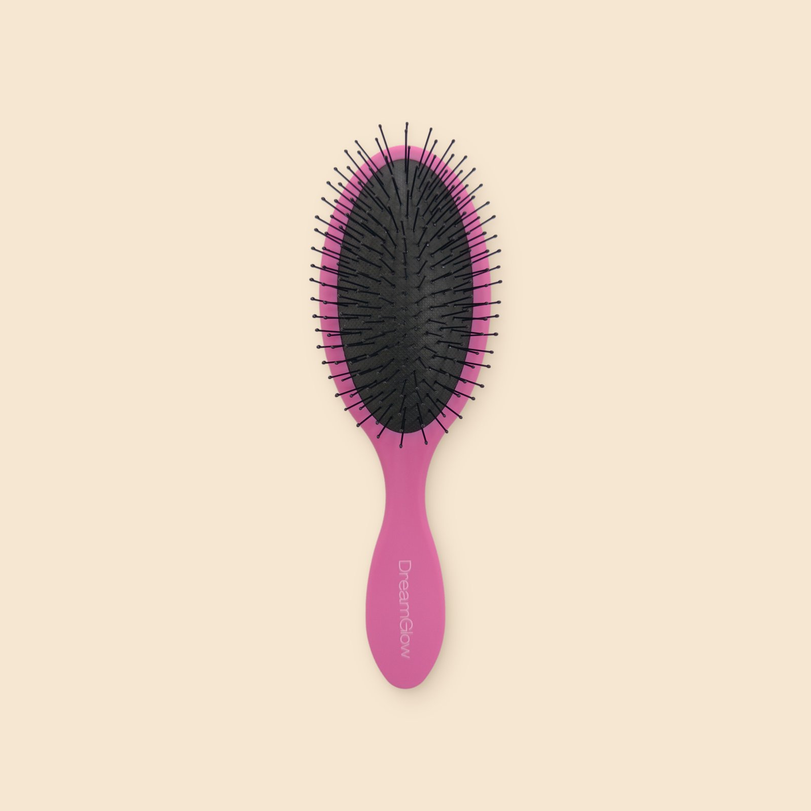 DreamGlow Ovale ontklitborstel Roze – voorkant met de pinnen